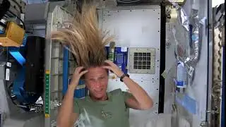 Astronaut Washing Hair