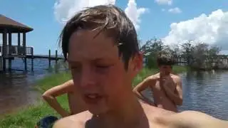 Kid dose front flip over railing