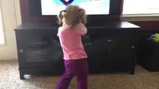 Baby dances while watching Caillou for the first time