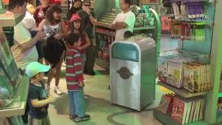 Push the talking trashcan at Walt Disney World