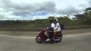 Japanese Tourist on a Moped