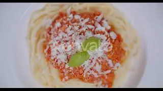 Closeup Of Tweezers Garnishing Basil On Spaghetti | Stock Footage - Envato elements