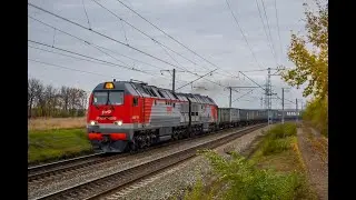 Тепловоз 2ТЭ25КМ-0280 с грузовым поездом