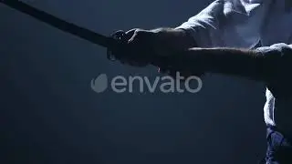 Man Fighting at Aikido Training with Japanese Sword Katana in Martial Arts School. Healthy Lifes...