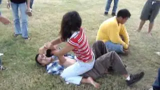 girl beating up guy