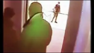 2 men kissing in elevator