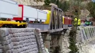 Big Sky Blue F45 leads long BN manifest freight on the club layout.