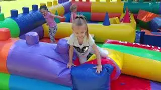 Anya and her friend are playing in the park
