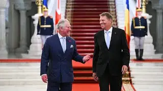 King Charles welcomed by Romanian President Klaus Iohannis at Cotroceni Palace
