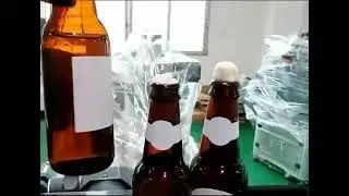 Этикетировка пивной бутылки с кольереткой