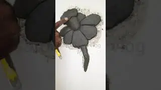 cement art /simple flower design on wall
