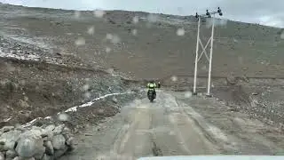 Riding Motorcycles Through large Mud Puddles