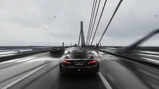 McLaren 720s racing down the highway...