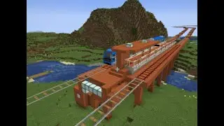 Trains go into gold statue