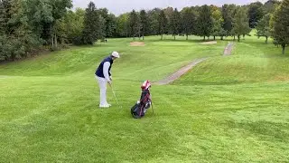 Watch Now: Auburn’s Carter Mizro hits approach shot during sectional play at Green Lakes golf