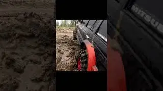 The tractor barely pulled out the Mitsubishi Pajero! 😐 