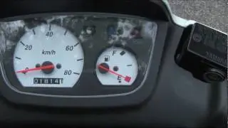 Gas fill-up Yamaha Scooter