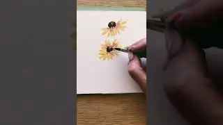 Loose watercolor daisies using a filbert brush