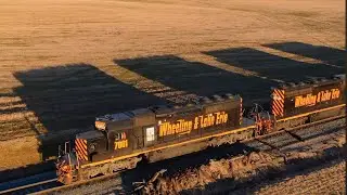Long Shadows on the Wheeling and Lake Erie Railway rock train W&LE 7001 7024 SD40-2