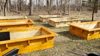 Installing/Staining  our Raised Beds