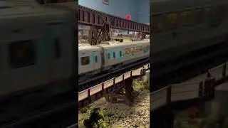 Amtrak Train Climbing Up to the City