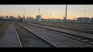 Treni al tramonto in arrivo e in partenza dalla stazione di Milano Centrale(VISTA EX SQUADRA RIALZO)