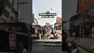 Road Rage Biker Throws Stone at Man's Truck