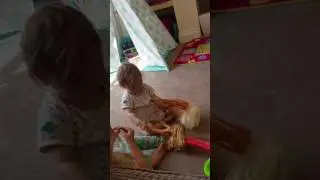 Kids fighting over barbie doll