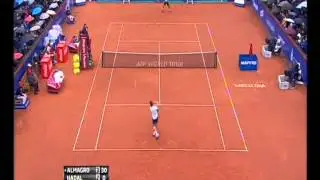 Nicolas Almagro  Rafael Nadal net play