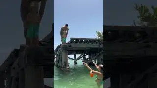 Brave 2-year-old jumps off an old railway bridge into the water!