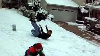 Mom Evie and Tony sled