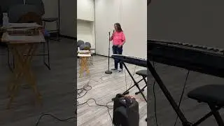 Kathy sings her signature song, "the Bear, (dog)"