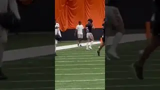 Ja’Marr Chase at Bengals practice in white t-shirt chatting up Tee Higgins Wednesday
