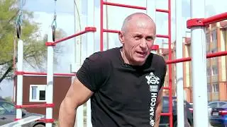 Pumping up your chest on outdoor exercise machines. Complex 1 of 3. Bodybuilding medalist Alexand...