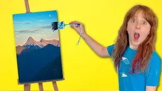 Lexie is Painting like Bob Ross