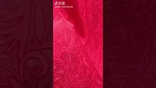 What is embossed silk satin?