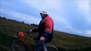 1. Bicycle with a motor from a petrol trimmer.