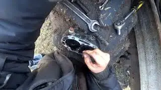 Changing the oil and filter in the T-150K transmission and replacing the compressor head gasket o...