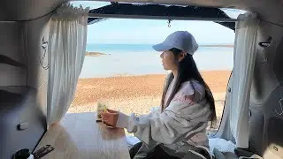 Eating and sleeping in a car in front of the sea...🚙