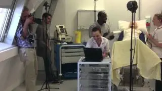 Photographer and models in a medical training simulation environment