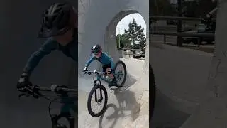 Kid fun at the skatepark. Bigger bikes, same hole!