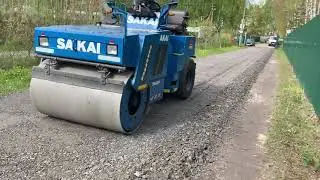 Асфальтовая крошка, укладка и укатка.