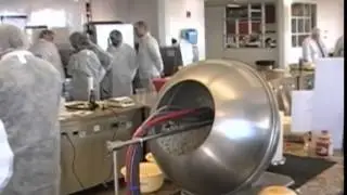 Spraying Cheese on Popcorn with AccuCoat® Pan Spraying System   Spraying Systems Co