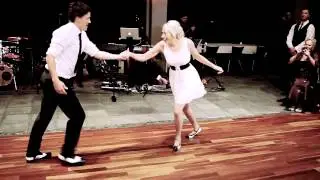 A super happy bride and groom kill their first dance