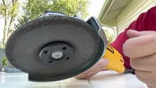 DeWALT DWE4011 Replace or remove the grinding wheel or disk on the 4 inch angle grinder. Unplug it