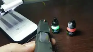 Alça e massa de mira, tinta glow, luminosidade.
