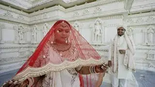 Unveiling Love's First Glance: Maunee & Rohan's Magical First Look at BAPS Shri Swaminarayan Mandir