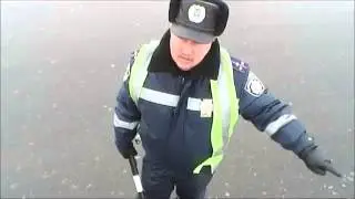 Що творить з ІДПС камера в руці водія ;))