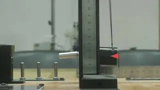Проверка закона сохранения импульса для неупругого удара