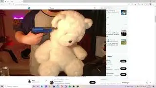 Empt holds a stuffed bear at gun point